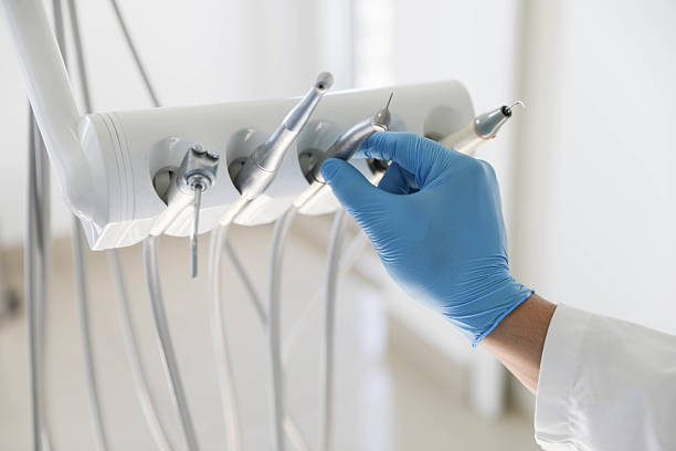 Professional Invisalign Clear Aligners technician working in Amityville, NY